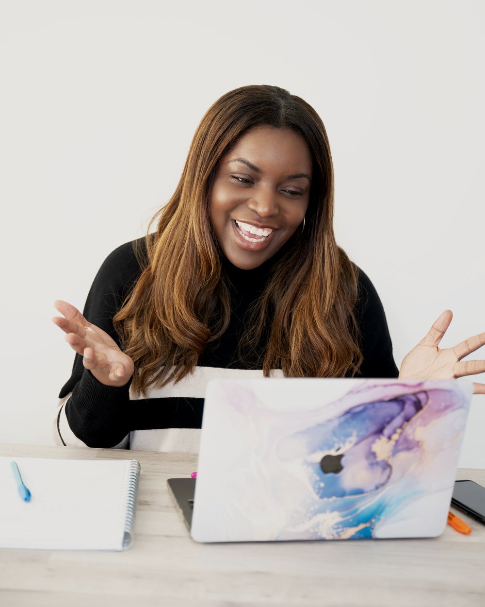 Toni Martin, mid-explanation at her laptop